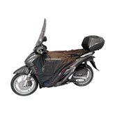 Coprigambe Termoscud R212X, un coprigambe impermeabile e termico. Su scooter. Di TUCANO URBANO.